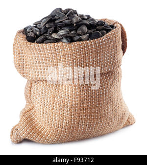Sonnenblumenkerne in Tasche isoliert auf weißem Hintergrund Stockfoto