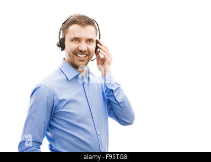 Call Center-Betreiber isoliert auf weiss. Schönen jungen Mann mit Kopfhörer. Stockfoto
