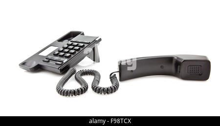 Moderne schwarze Telefon mit Mobilteil auf weißem Hintergrund Stockfoto