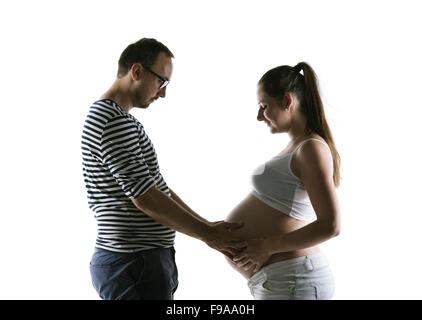 Silhouette der schwangeren Brautpaar posiert im Studio, isoliert auf weißem Hintergrund Stockfoto