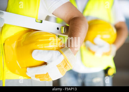 Bauarbeiter, die gemeinsam an neuen Hausbau Stockfoto