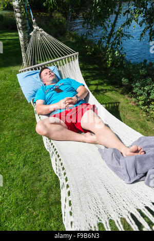 Schlafen in der Hängematte Stockfoto