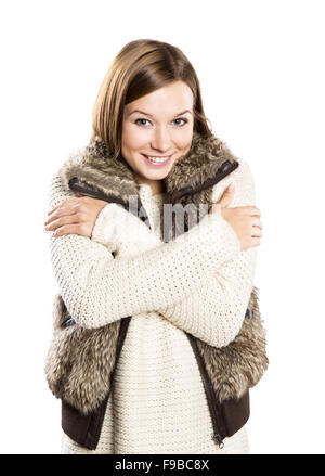 Schöne Frau mit Pullover posiert im Studio, Wintermode Stockfoto