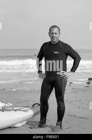 2015 .surfing .broadstairs. Neoprenanzug, lange Brett, grün, Meer, Ostlage, Ebbe, heiße Quellen, Mann, leiden, Surfen, Wellen, Wasser Stockfoto