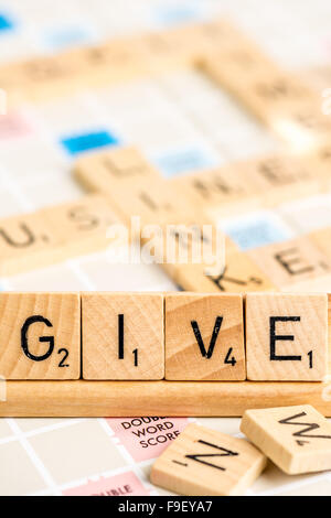 Scrabble - geben Stockfoto