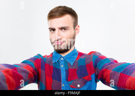 Selfie Foto attraktive überzeugt junge Mann im karierten Hemd Stockfoto