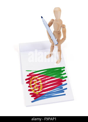 Hölzerne Puppe gemacht eine Zeichnung einer Flagge - Eritrea Stockfoto