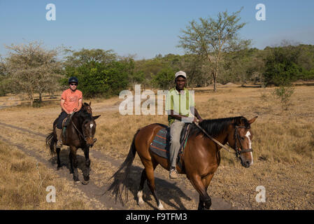 Reiten Safari, Lake Mburo National Park, Uganda Stockfoto