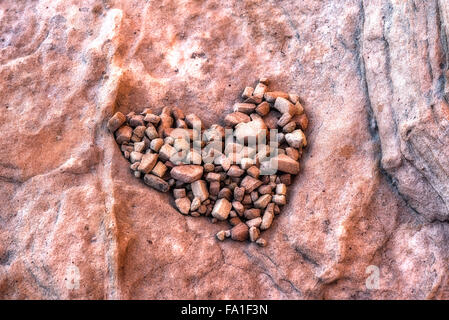 Kleine Felsen gebildet in der Form eines Herzens. Stockfoto