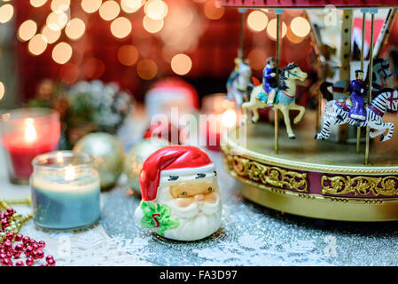 Merry Go Round und Kerzen Weihnachtsschmuck Stockfoto