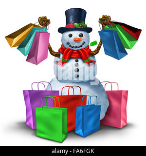 Winter shopping und Weihnachten Verkauf Konzept als eine glückliche Schneemann hält eine Gruppe von Einzelhandel Gepäck als freudige Kunde und Urlaub Shopper Symbol. Stockfoto