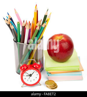 Wecker mit roter Apfel Stockfoto
