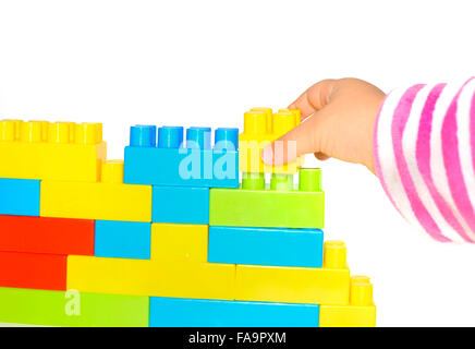 Stack-Hand up Lego set als Wand auf weißem Hintergrund Stockfoto