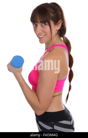 Lächelnde Fitness Frau im Sport Training Training mit Hantel Seitenansicht isoliert auf weißem Hintergrund Stockfoto