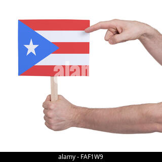 Hand, die kleine Karte, isoliert auf weiss - Flag von Puerto Rico Stockfoto