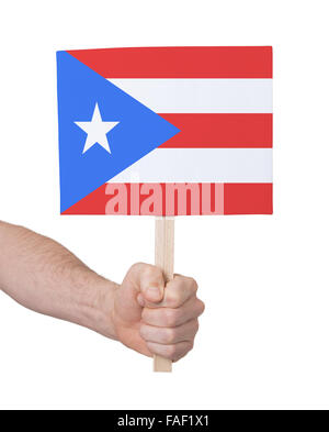Hand, die kleine Karte, isoliert auf weiss - Flag von Puerto Rico Stockfoto