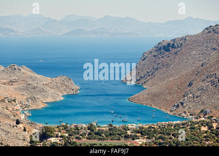 Die Bucht von Pedi auf der Insel Symi, Griechenland Stockfoto