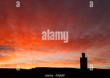 Sonnenuntergang und Minarett. Ait Benhaddou. Marokko. Nordafrika. Stockfoto