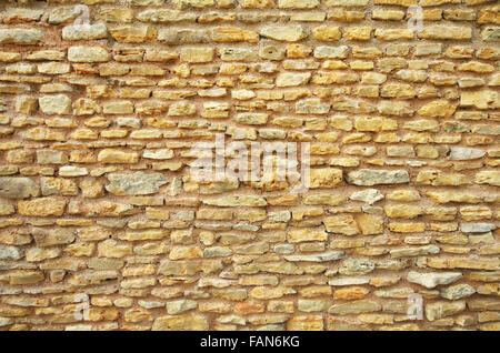 Wand-Hintergrundtextur aus Kalkstein Stockfoto