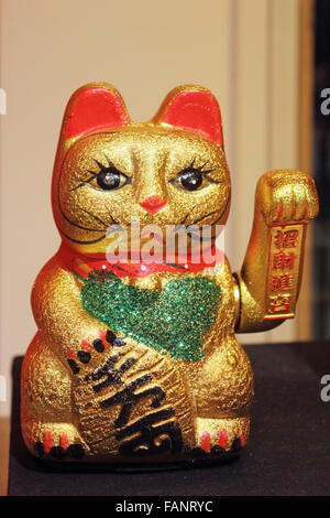 Maneki-Neko nennt man manchmal auch die freundliche Katze, glückliche Katze, Geld Katze, der happy Cat, verlockende Katze oder Vermögen Katze. Stockfoto