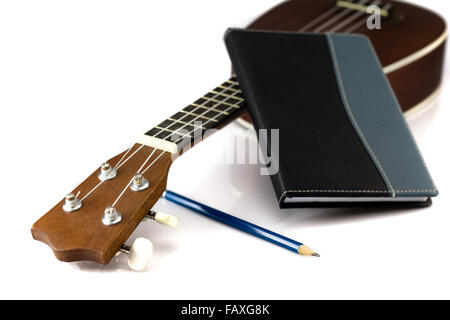 Konzept-Lied-Komponisten: Notebook und Bleistift, Ukulele Stockfoto