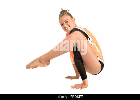 Teenager-Mädchen in Gymnastik Outfit isoliert in weiß Stockfoto