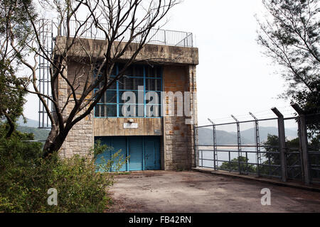 Es ist ein Foto von einem kleinen Gebäude in der Nähe ein Wasser-Reservoir in Hong Kong Stockfoto