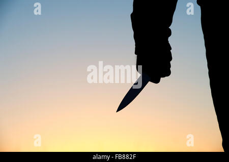 Hand, die Messer silhouette Stockfoto