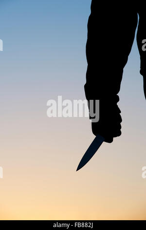 Hand, die Messer silhouette Stockfoto