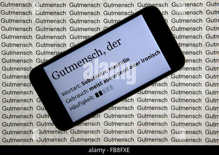 München, Deutschland. 12. Januar 2016. ILLUSTRATION - "Gutmensch" (lit.) Gutmensch) auch seine Definition in Deutsch auf einem Smartphonebildschirm in München, Deutschland, 12. Januar 2016 abgebildet. Der Begriff wurde gewählt, "2015 nicht-Wort des Jahres." Foto: STEPHAN JANSEN/Dpa/Alamy Live News Stockfoto