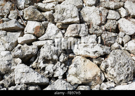 Rohsteine trockene Wand Textur Hintergrund im Sonnenlicht, Mittelmeerküste Stockfoto