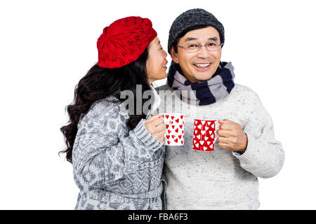 Ältere asiatische Paare haben heiße Getränke Stockfoto
