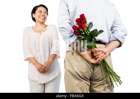 Ältere asiatische paar mit Rosen Stockfoto