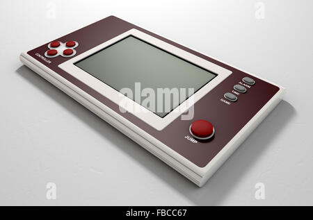 Ein Vintage handheld Spielkonsole mit einem leeren Bildschirm auf einem isolierten weißen Hintergrund Stockfoto