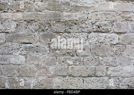 Grau, verwitterte Steinblöcken Wand Textur Hintergrund Stockfoto