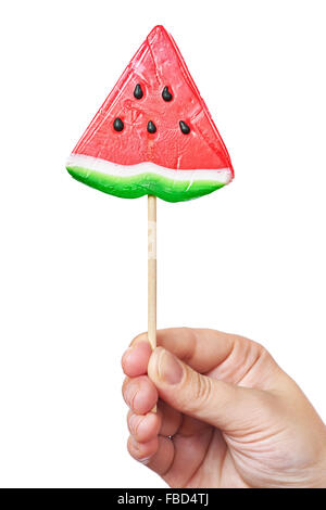 Hand, die Lutscher in Form einer Wassermelone Stockfoto