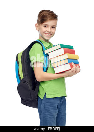 glückliche Schüler junge mit Schulranzen und Büchern Stockfoto