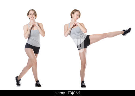 Junge fröhlich sportlich schöne Frau tun Routine-Übung, in voller Länge isoliert Studio Bild auf weißem Hintergrund Stockfoto