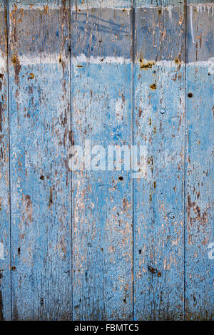 Alte bemalte hölzerne Tür Textur. Großbritannien Stockfoto