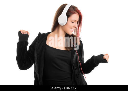 Tanzen mein Lied entfernt. Junge Mädchen in einem Hoodie mit Kopfhörer, auf weißem Hintergrund. Stockfoto