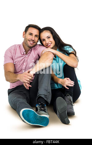 Porträt des glücklichen Paares sitzen Stockfoto
