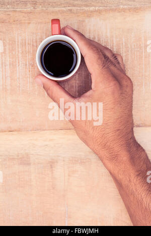 Nahaufnahme der Geschäftsmann mit schwarzen Kaffee Stockfoto