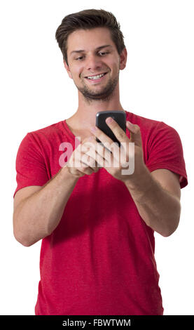 Junger Mann, der auf seinem Smartphone arbeitet Stockfoto