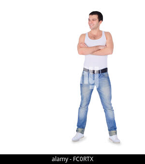 Junge Mode Mann stehend über weiß Stockfoto