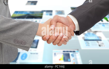 Zusammengesetztes Bild des Handshakes zwischen zwei Geschäftsleute Stockfoto