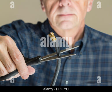 Isolierte Foto Konzept des Schneidens Kabel Stockfoto