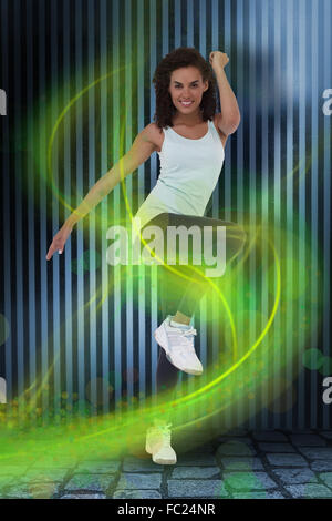 Zusammengesetztes Bild Fit Frau tun aerobe Übung Stockfoto