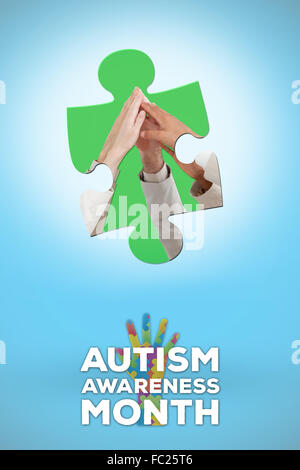 Zusammengesetztes Bild von Geschäftsleuten mit Teamgeist Stockfoto