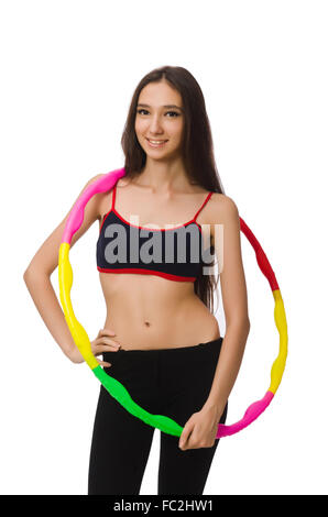 Ein Mädchen im Sport Anzug mit Hula-Hoop isoliert auf weiss Stockfoto