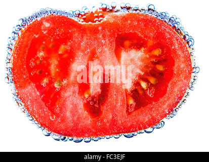 Isolierte Tomaten in Wasser Stockfoto